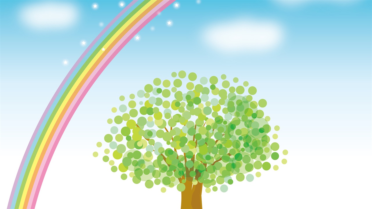 緑の木と青空と大きな虹